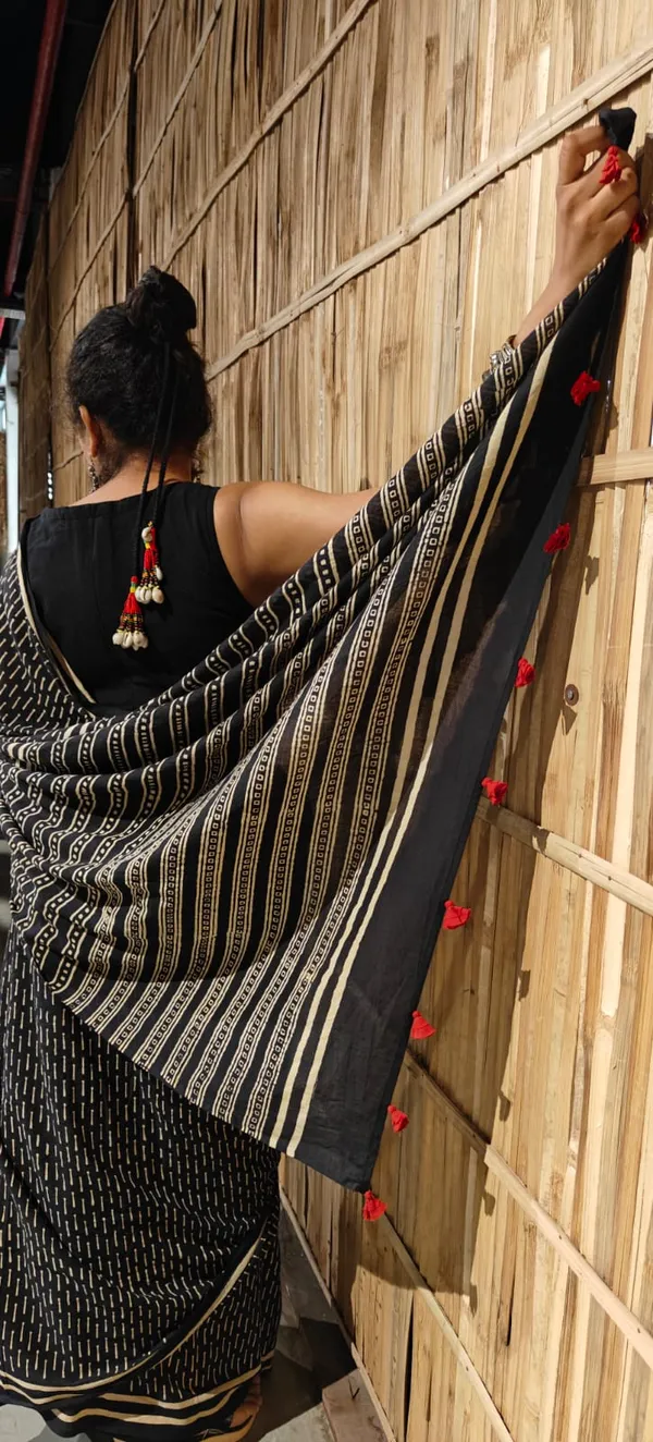 Noir_Cream_With_Scarlet_Tassels_Mulmul_Saree_With_Unstitched_Blouse_Piece