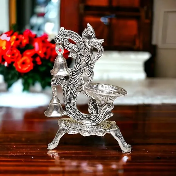 Peacock_Antique_Design_Single_batti_Diya_for_Home_Decor_Aarti_Home_Temple_Decoration_Metal_Table_Diya_Size_L14_x_W9_x_H20_cm_(Silver_Metal,_Pack_of_1_Pcs)