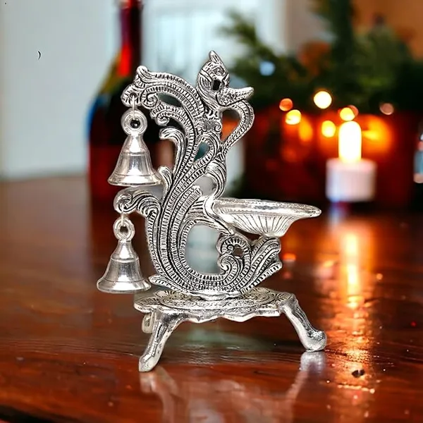 Peacock_Antique_Design_Single_batti_Diya_for_Home_Decor_Aarti_Home_Temple_Decoration_Metal_Table_Diya_Size_L14_x_W9_x_H20_cm_(Silver_Metal,_Pack_of_1_Pcs)