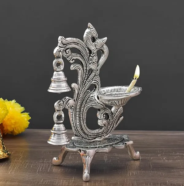 Peacock_Antique_Design_Single_batti_Diya_for_Home_Decor_Aarti_Home_Temple_Decoration_Metal_Table_Diya_Size_L14_x_W9_x_H20_cm_(Silver_Metal,_Pack_of_1_Pcs)