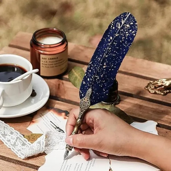 Luxury_Feather_Quill_Dip_Pen_Set,_Includes_2_Extra_Nibs_&_Stand,_Black_Ink,_Vintage_Calligraphy_Set_for_Signature_&_Art,_Ideal_Gift_for_Writers_&_Artists_(Glittery_Blue)