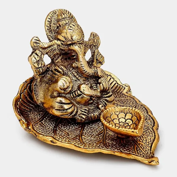 Ganesh_Idol_on_Leaf_-_Lord_Ganesha_with_Diya_-_Metal_Diya_for_Diwali_Decoration_Items_Home_Decorative_Gift_Puja_Gifts_Corporate,_Diwali_Gift_Item