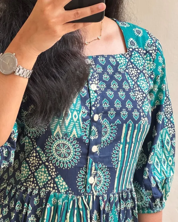 Beautiful_ikkat_Printed_Cotton_Full_Flair_Middy_Gown_Short_Kurti