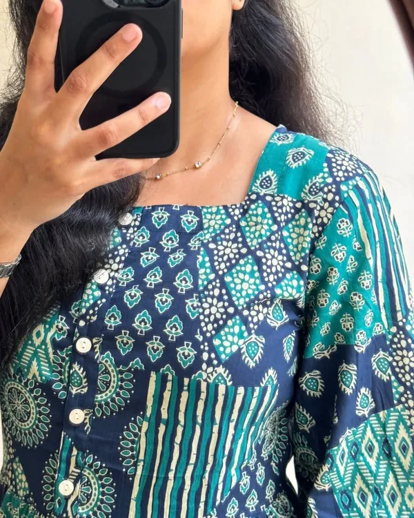 Beautiful_ikkat_Printed_Cotton_Full_Flair_Middy_Gown_Short_Kurti