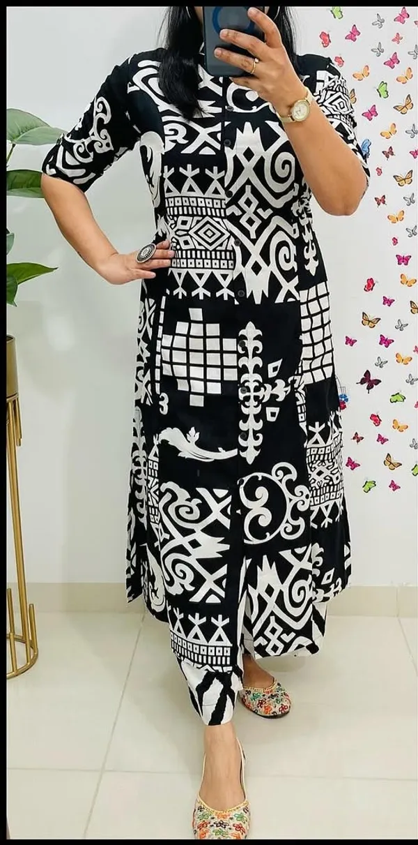 Women_Black_Geometric_Printed_Cotton_Co-ord_Set_A-line_Pattern_Paried_With_Ankle_Length_Pant_(CORD_SET)