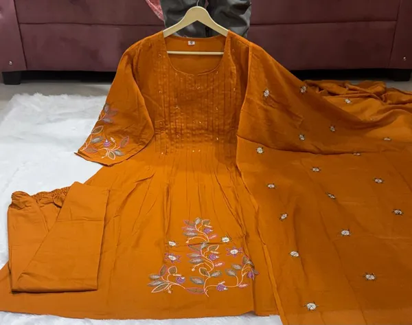 Women_Cotton_Graceful_Pin-Tuck_(Pintex)_And_Embroidered_Worked_Rust-Orange_Kurta_With_Pant_And_Mulmul_Dupatta