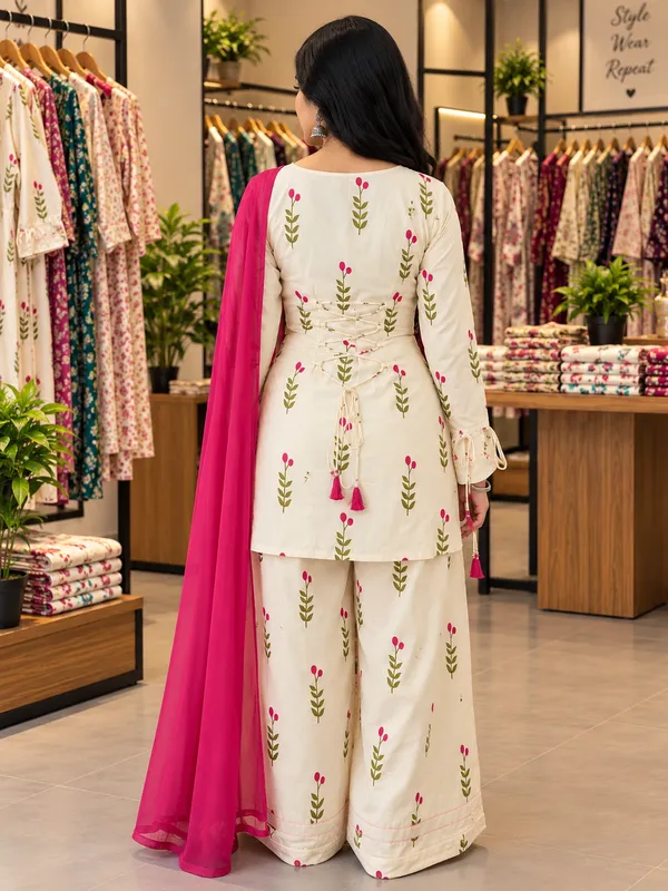 Women_And_Girls_Farshi_Cotton_Flower_Printed_White_Kurti_With_Back_Side_Dori_With_Patiyala_Pant_And_Pink_Dupatta