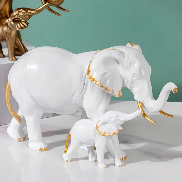 Maxxinn_Resin_Mother_Elephant_with_Baby_Figurine_Showpiece_–_Antique_Gold_Polyresin_Sculpture_for_Home_Decoration_
