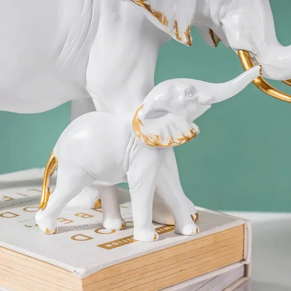 Maxxinn_Resin_Mother_Elephant_with_Baby_Figurine_Showpiece_–_Antique_Gold_Polyresin_Sculpture_for_Home_Decoration_