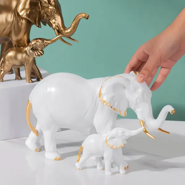 Maxxinn_Resin_Mother_Elephant_with_Baby_Figurine_Showpiece_–_Antique_Gold_Polyresin_Sculpture_for_Home_Decoration_