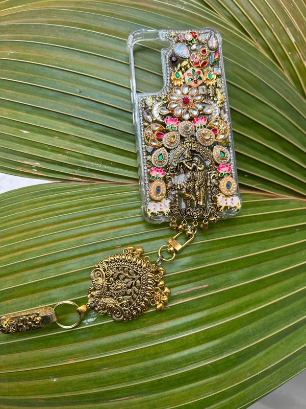 Radha_Krishna_Divine_Art_Phone_Case_with_Handcrafted_Kundan__with_saree_pin_phone_case_|_cover