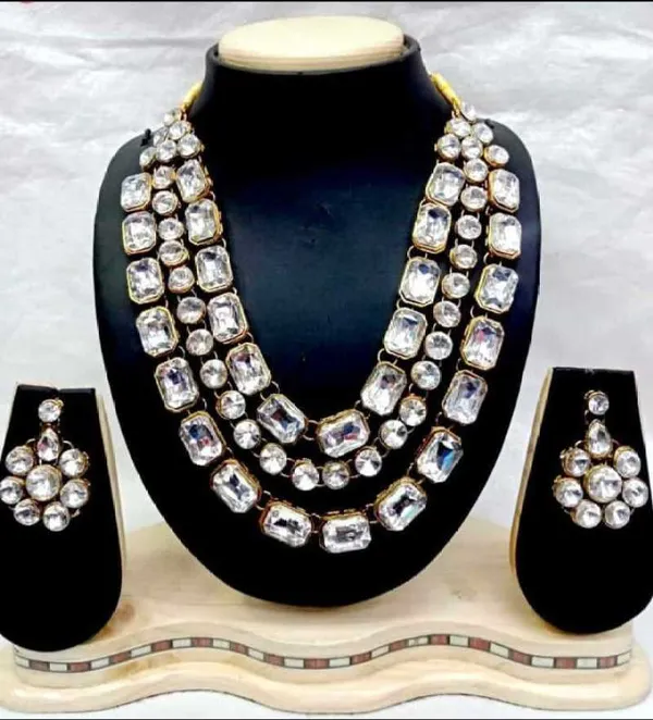 https://d1311wbk6unapo.cloudfront.net/NushopCatalogue/tr:f-webp,w-600,fo-auto/66838ef5cc444766cd5b63d9/cat_img/LAYERED_NECKLACE_SET__7LQ4I7CW2W_2024-08-14_1.jpeg__JewelShadi