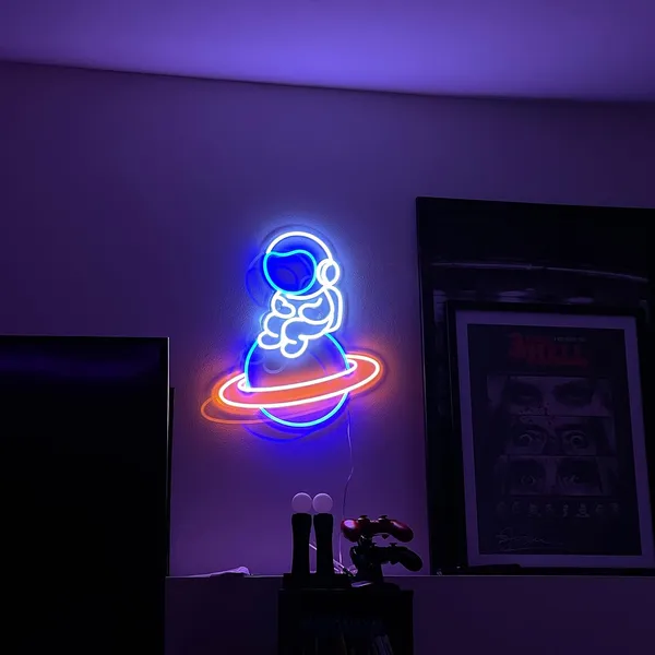 Blue_Space_Astronaut_Sitting_On_Planet_Neon_Sign_15X20_Inch
