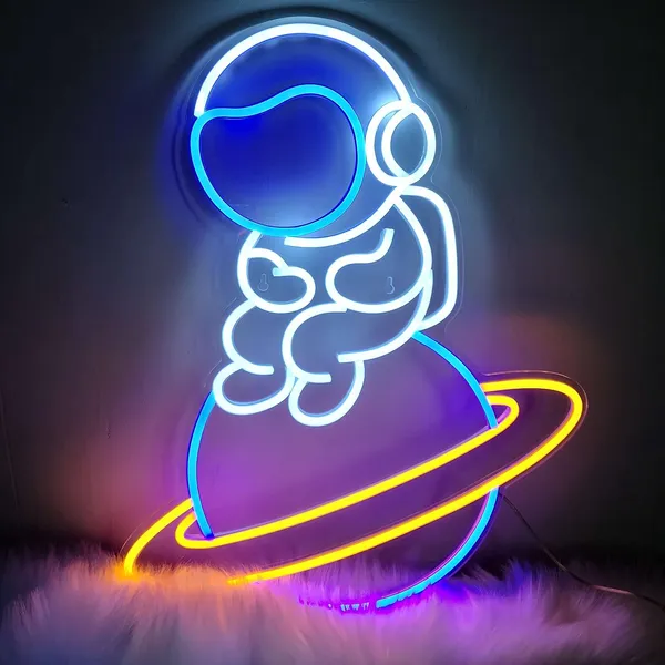 Blue_Space_Astronaut_Sitting_On_Planet_Neon_Sign_15X20_Inch