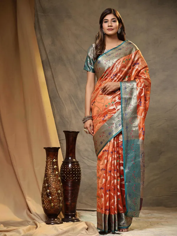 Orange_Organza_Silk_Fabric_With_Zari_Weaving_Rich_Pallu_And_Contrast_Meenakri_Weaving_Border_Saree