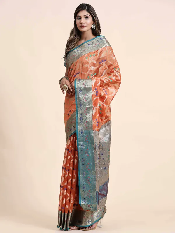 Orange_Organza_Silk_Fabric_With_Zari_Weaving_Rich_Pallu_And_Contrast_Meenakri_Weaving_Border_Saree