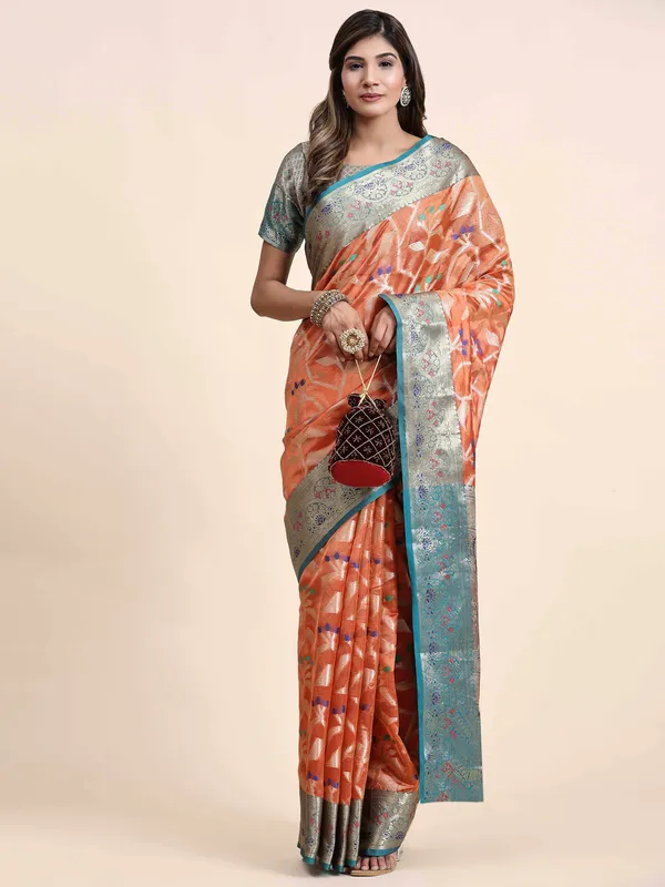 Orange_Organza_Silk_Fabric_With_Zari_Weaving_Rich_Pallu_And_Contrast_Meenakri_Weaving_Border_Saree