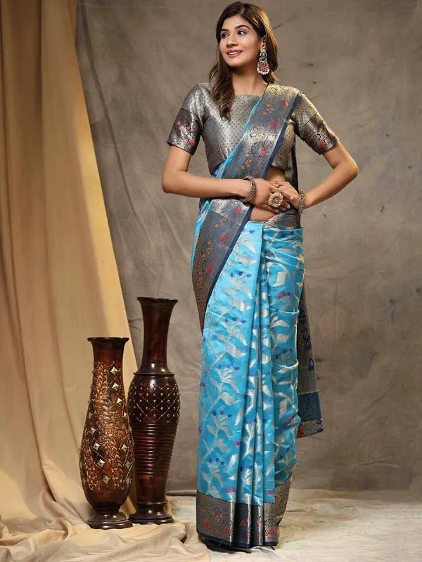 Sky_Blue_Organza_Silk_Fabric_With_Zari_Weaving_Rich_Pallu_And_Contrast_Meenakri_Weaving_Border_Saree
