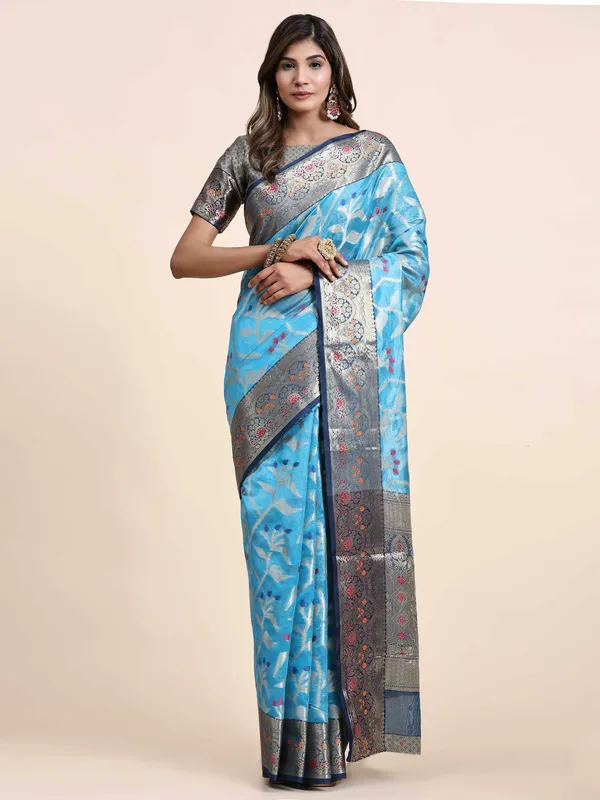 Sky_Blue_Organza_Silk_Fabric_With_Zari_Weaving_Rich_Pallu_And_Contrast_Meenakri_Weaving_Border_Saree