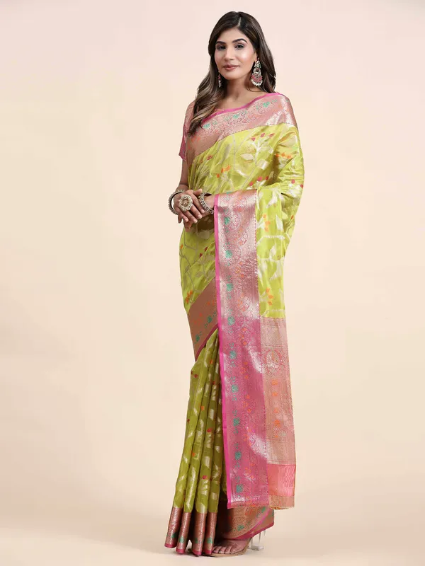Green_Organza_Silk_Fabric_With_Zari_Weaving_Rich_Pallu_And_Contrast_Meenakri_Weaving_Border_Saree