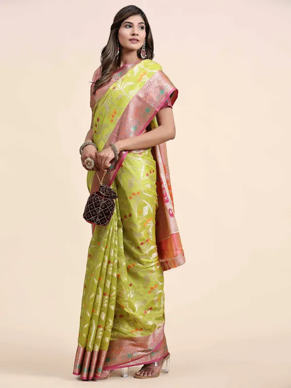 Green_Organza_Silk_Fabric_With_Zari_Weaving_Rich_Pallu_And_Contrast_Meenakri_Weaving_Border_Saree