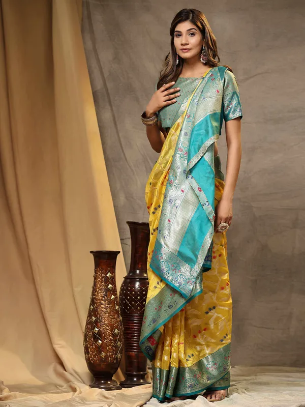 Yellow_Organza_Silk_Fabric_With_Zari_Weaving_Rich_Pallu_And_Contrast_Meenakri_Weaving_Border_Saree