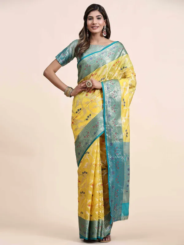 Yellow_Organza_Silk_Fabric_With_Zari_Weaving_Rich_Pallu_And_Contrast_Meenakri_Weaving_Border_Saree