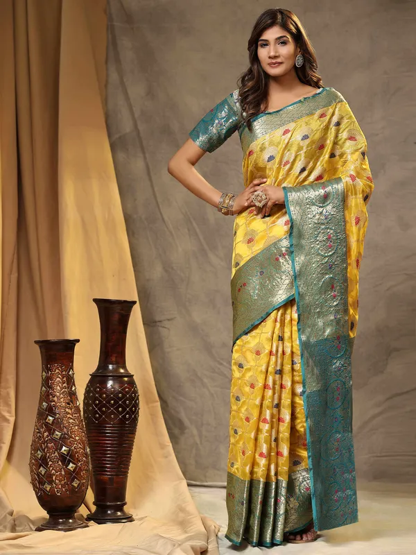 Yellow_Organza_Silk_Fabric_With_Zari_Weaving_Rich_Pallu_And_Contrast_Meenakri_Weaving_Border_Saree