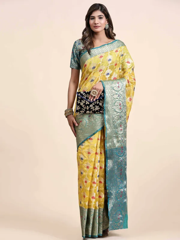 Yellow_Organza_Silk_Fabric_With_Zari_Weaving_Rich_Pallu_And_Contrast_Meenakri_Weaving_Border_Saree