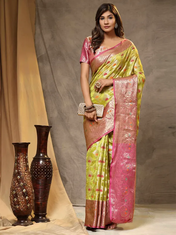 Green_Organza_Silk_Fabric_With_Zari_Weaving_Rich_Pallu_And_Contrast_Meenakri_Weaving_Border_Saree