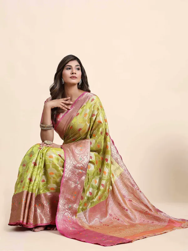 Green_Organza_Silk_Fabric_With_Zari_Weaving_Rich_Pallu_And_Contrast_Meenakri_Weaving_Border_Saree