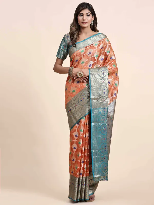 Orange_Organza_Silk_Fabric_With_Zari_Weaving_Rich_Pallu_And_Contrast_Meenakri_Weaving_Border_Saree