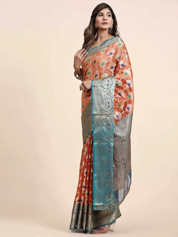 Orange_Organza_Silk_Fabric_With_Zari_Weaving_Rich_Pallu_And_Contrast_Meenakri_Weaving_Border_Saree