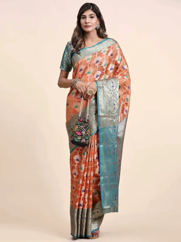 Orange_Organza_Silk_Fabric_With_Zari_Weaving_Rich_Pallu_And_Contrast_Meenakri_Weaving_Border_Saree