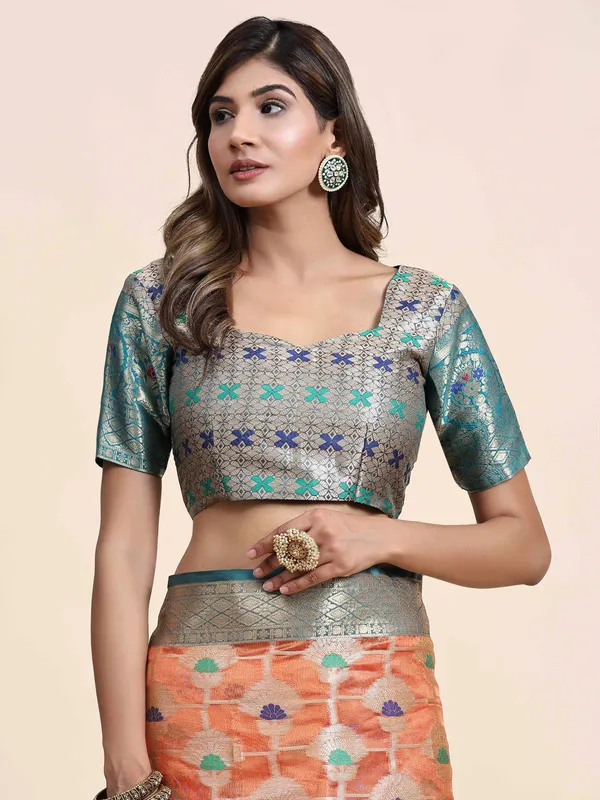 Orange_Organza_Silk_Fabric_With_Zari_Weaving_Rich_Pallu_And_Contrast_Meenakri_Weaving_Border_Saree