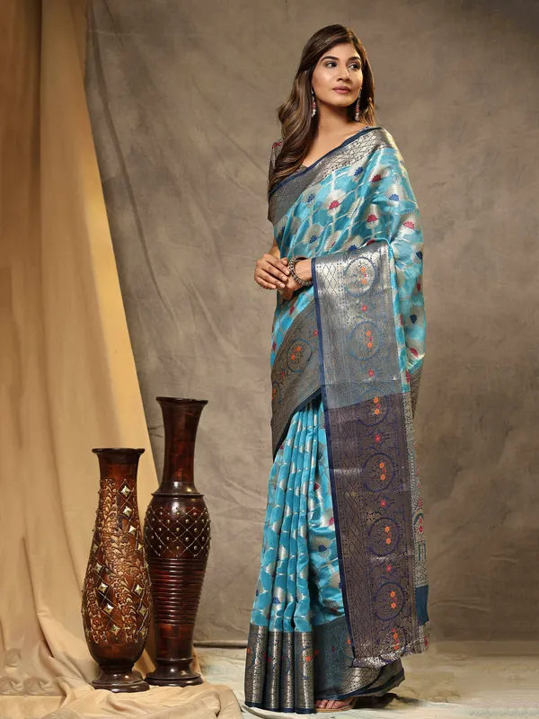 Sky_Blue_Organza_Silk_Fabric_With_Zari_Weaving_Rich_Pallu_And_Contrast_Meenakri_Weaving_Border_Saree