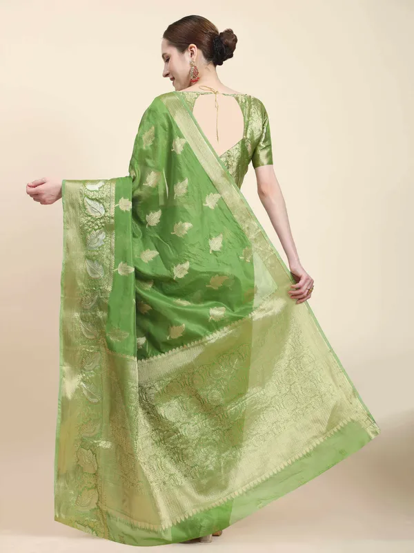 Dark_Green_Organza_Silk_Fabric_With_Zari_Weaving_Rich_Pallu_And_Contrast_Meenakri_Weaving_Border_Saree