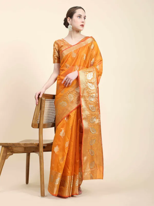 Orange_Organza_Silk_Fabric_With_Zari_Weaving_Rich_Pallu_And_Contrast_Meenakri_Weaving_Border_Saree