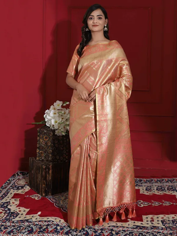 Peach_Kanjeevarm_Silk_With_Geometric_Pallu_And_Lehriya_Weaving_Body_Saree