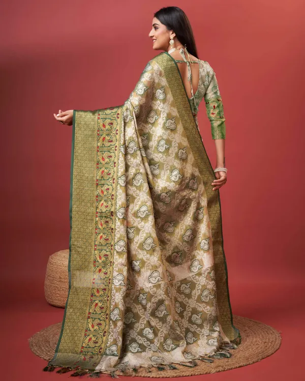 Green_Pure_Organza_Silk_With_Zari_Pallu_And_Rich_Zari_Wooven_Border_With_Weaving_Design_Tassle_Saree