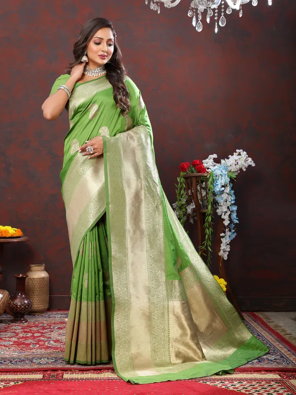 Green_Soft_Silk_With_Zari_Weaving_Design_And_Rich_Zari_Weaving_Pallu_Border_Saree