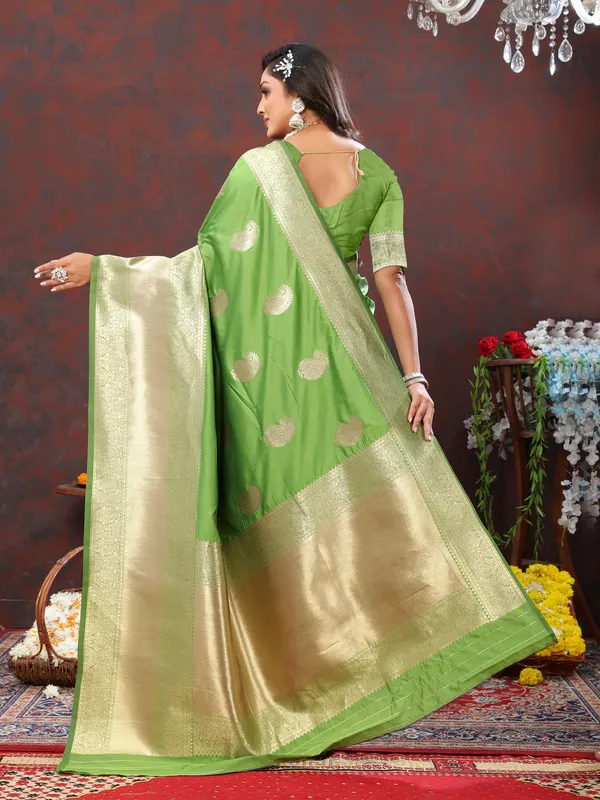 Green_Soft_Silk_With_Zari_Weaving_Design_And_Rich_Zari_Weaving_Pallu_Border_Saree