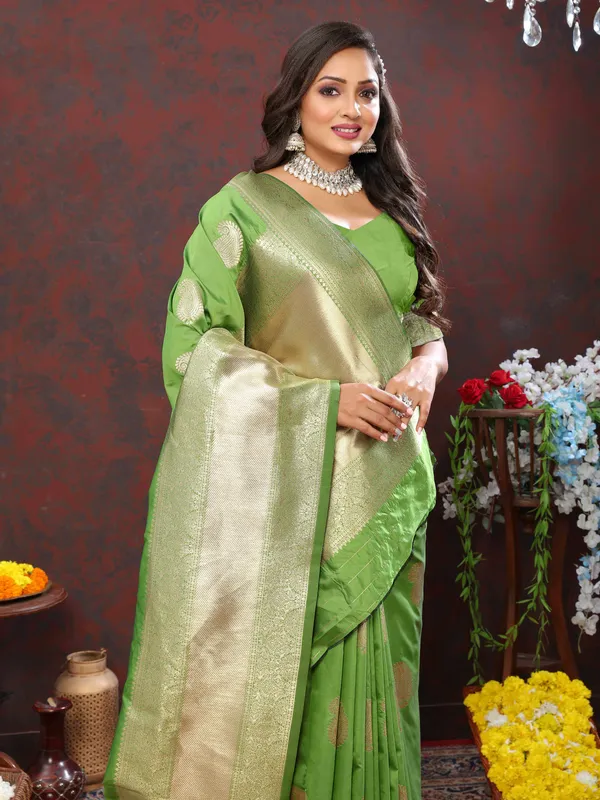 Green_Soft_Silk_With_Zari_Weaving_Design_And_Rich_Zari_Weaving_Pallu_Border_Saree