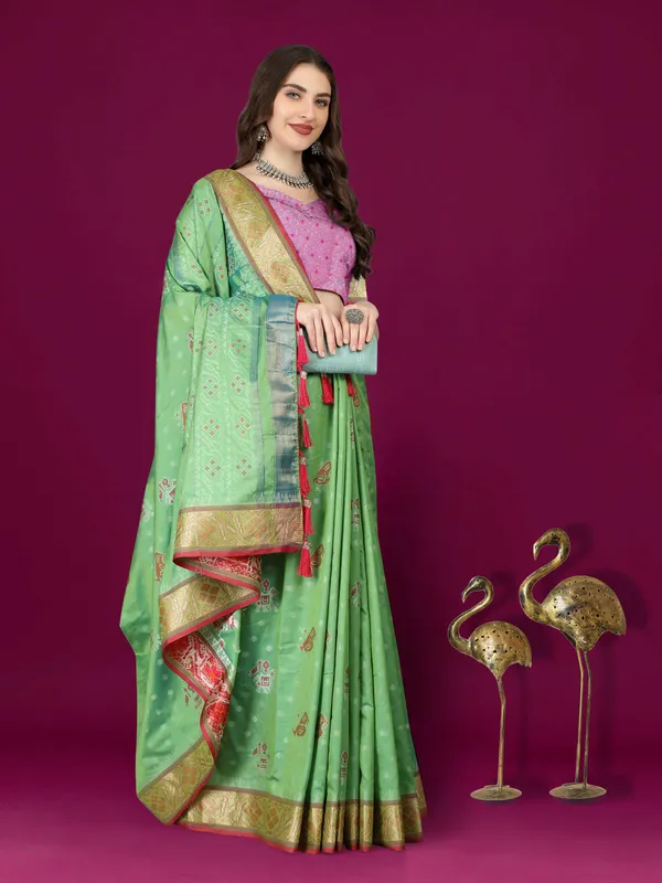 Pista_Green_Soft_Patola_Silk_With_Meenakari_Zari_Weaving_Motifs_And_Rich_Zari_Weaving_Pallu_Saree