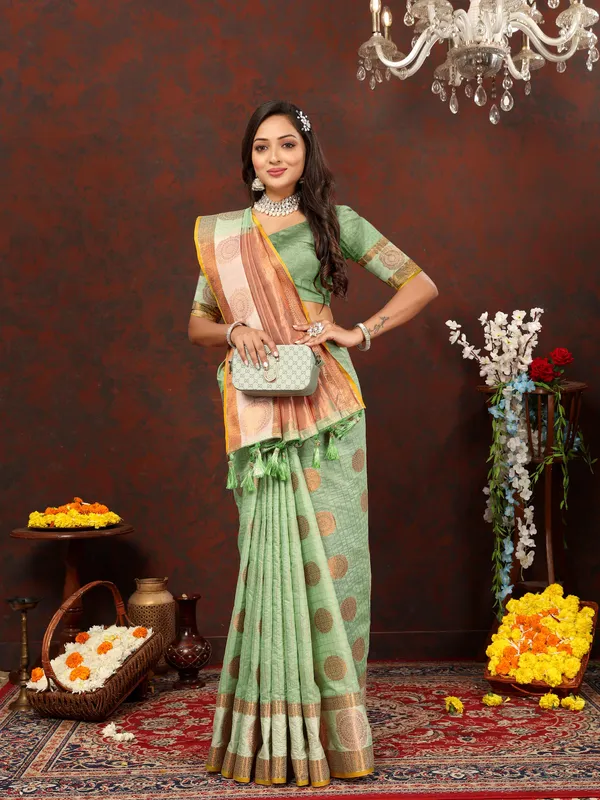 Pista_Green_Soft_Cotton_With_Zari_Weaving_Design_And_Rich_Zari_Weaving_Pallu_Saree
