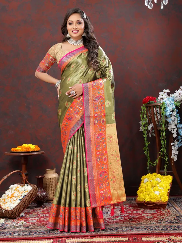 Olive_Green_Soft_Kanjivaram_Silk_With_Zari_Weaving_Design_And_Rich_Zari_Weaving_Pallu_Border_Saree