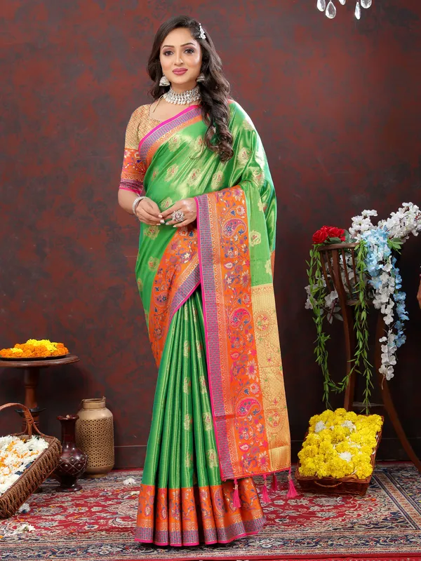 Green_Soft_Kanjivaram_Silk_With_Zari_Weaving_Design_And_Rich_Zari_Weaving_Pallu_Border_Saree