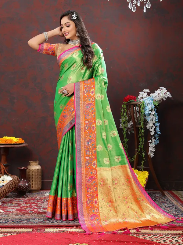 Green_Soft_Kanjivaram_Silk_With_Zari_Weaving_Design_And_Rich_Zari_Weaving_Pallu_Border_Saree