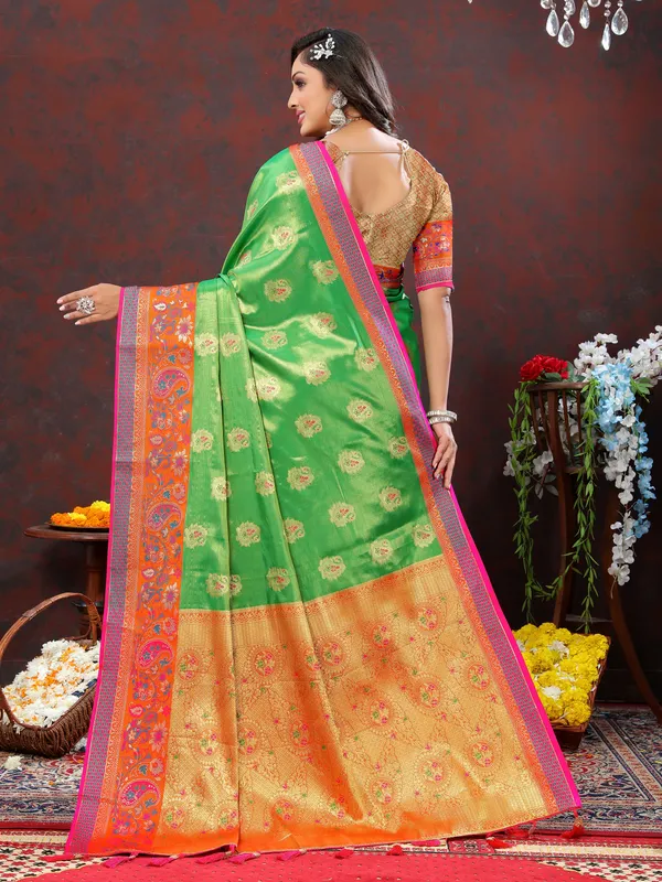Green_Soft_Kanjivaram_Silk_With_Zari_Weaving_Design_And_Rich_Zari_Weaving_Pallu_Border_Saree