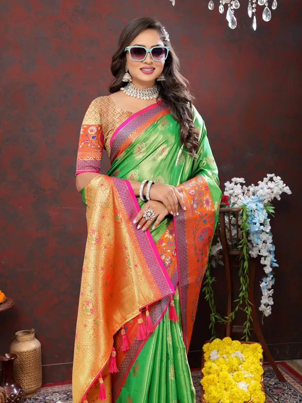 Green_Soft_Kanjivaram_Silk_With_Zari_Weaving_Design_And_Rich_Zari_Weaving_Pallu_Border_Saree